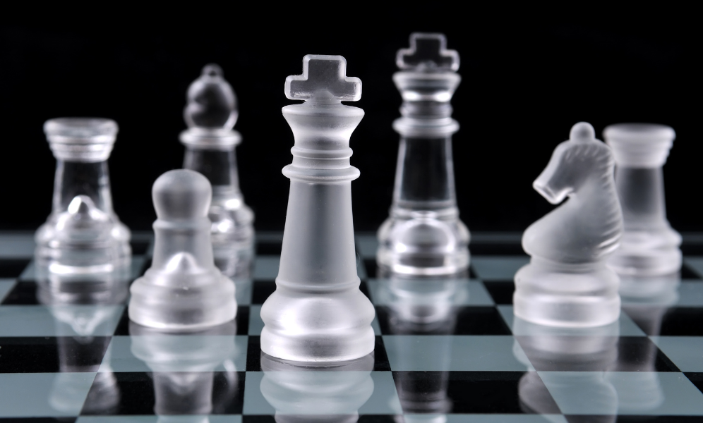 The Overworked Piece: Spotting and Exploiting Defensive Overload in Chess